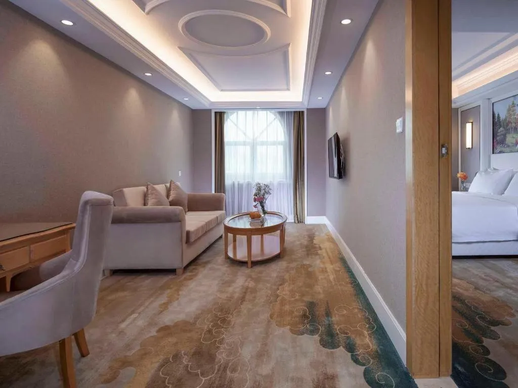 Bed in Vienna Hotel Shenzhen Pingdi Huancheng South Road