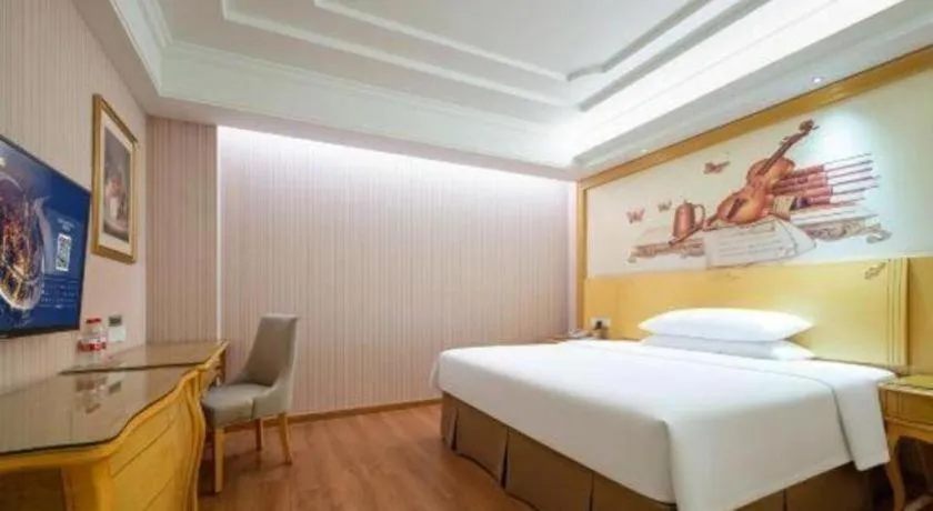 Bed in Vienna Hotel Shenzhen Pingdi Huancheng South Road