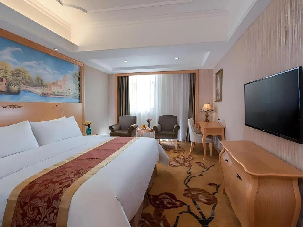 Bed in Vienna Hotel Shenzhen Pingdi Huancheng South Road