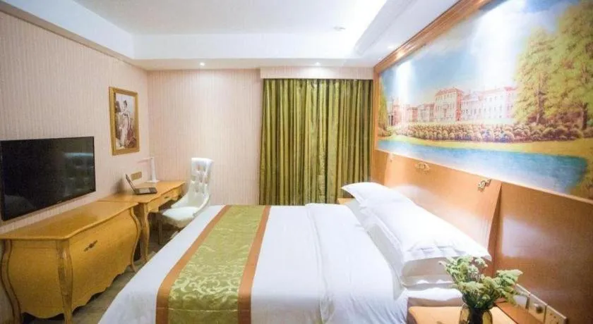 Bed in Vienna Hotel Shandong Laizhou Langhu International Plaza