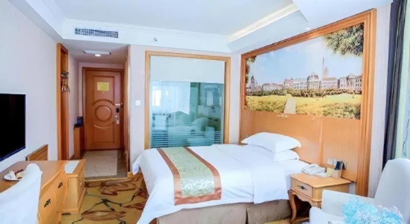 Bed in Vienna Hotel Shandong Laizhou Langhu International Plaza