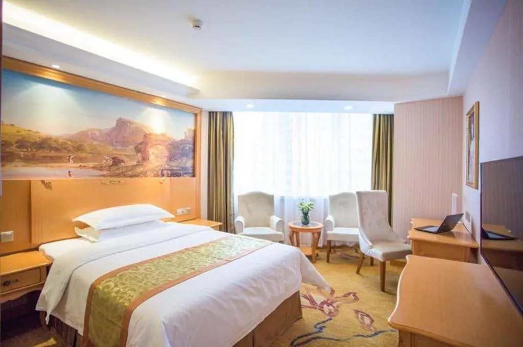 Bed in Vienna Hotel Shandong Laizhou Langhu International Plaza
