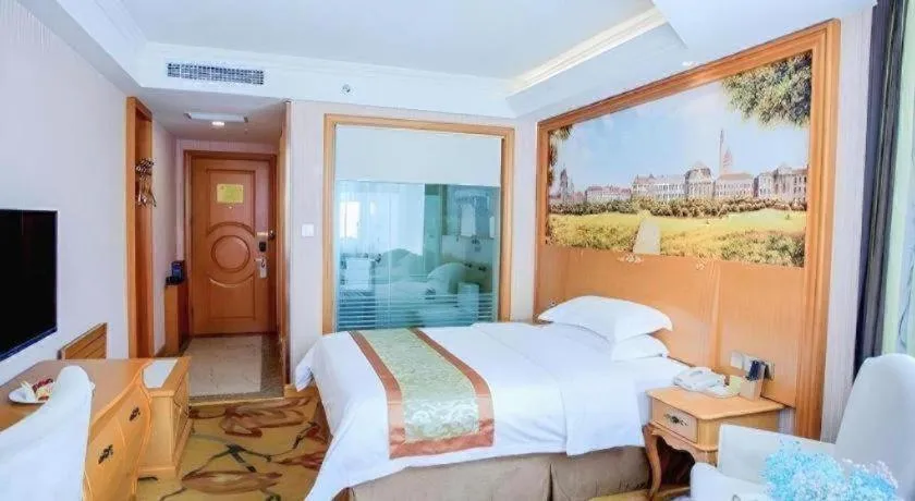 Bed in Vienna Hotel Shandong Laizhou Langhu International Plaza