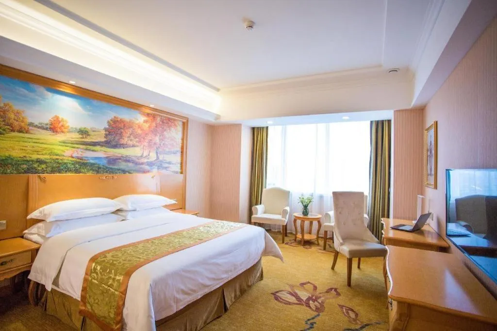 Bed in Vienna Hotel Shandong Laizhou Langhu International Plaza