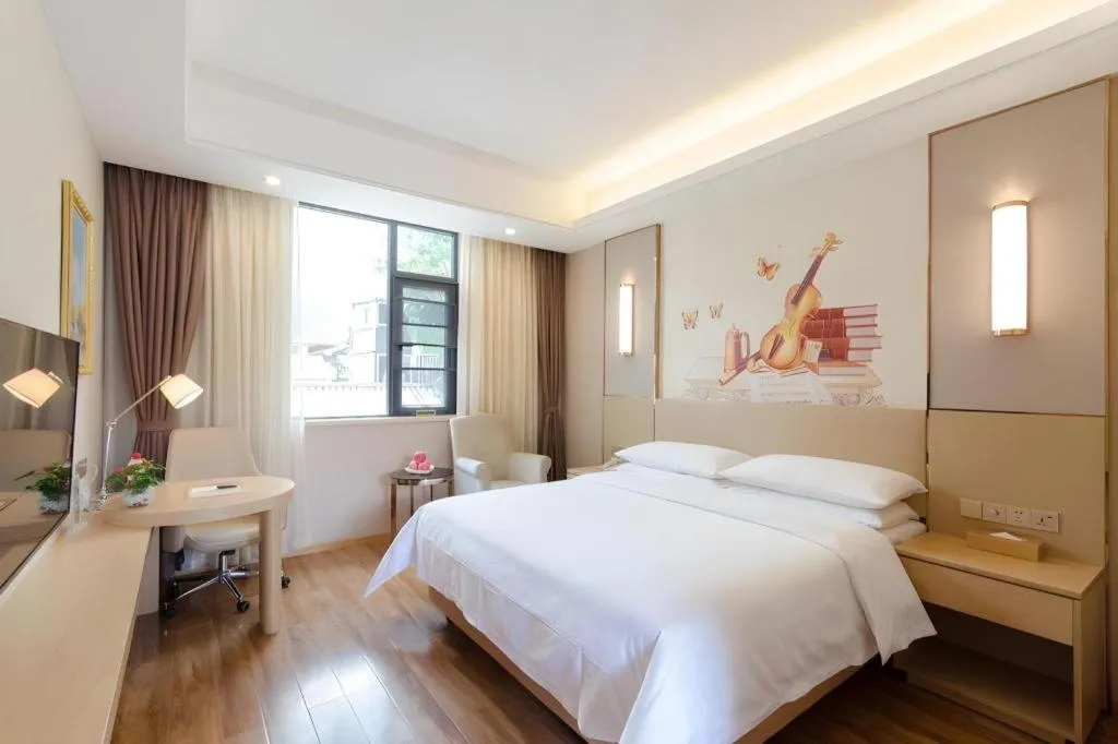 Bed in Vienna Hotel Yunnan Dali Ancient City Scenic Spot