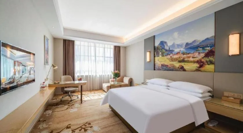 Bed in Vienna Hotel Guangdong Shaoguan Shaonan Avenue