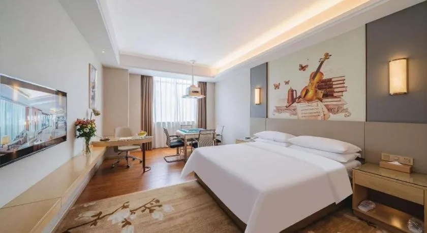 Bed in Vienna Hotel Guangdong Shaoguan Shaonan Avenue