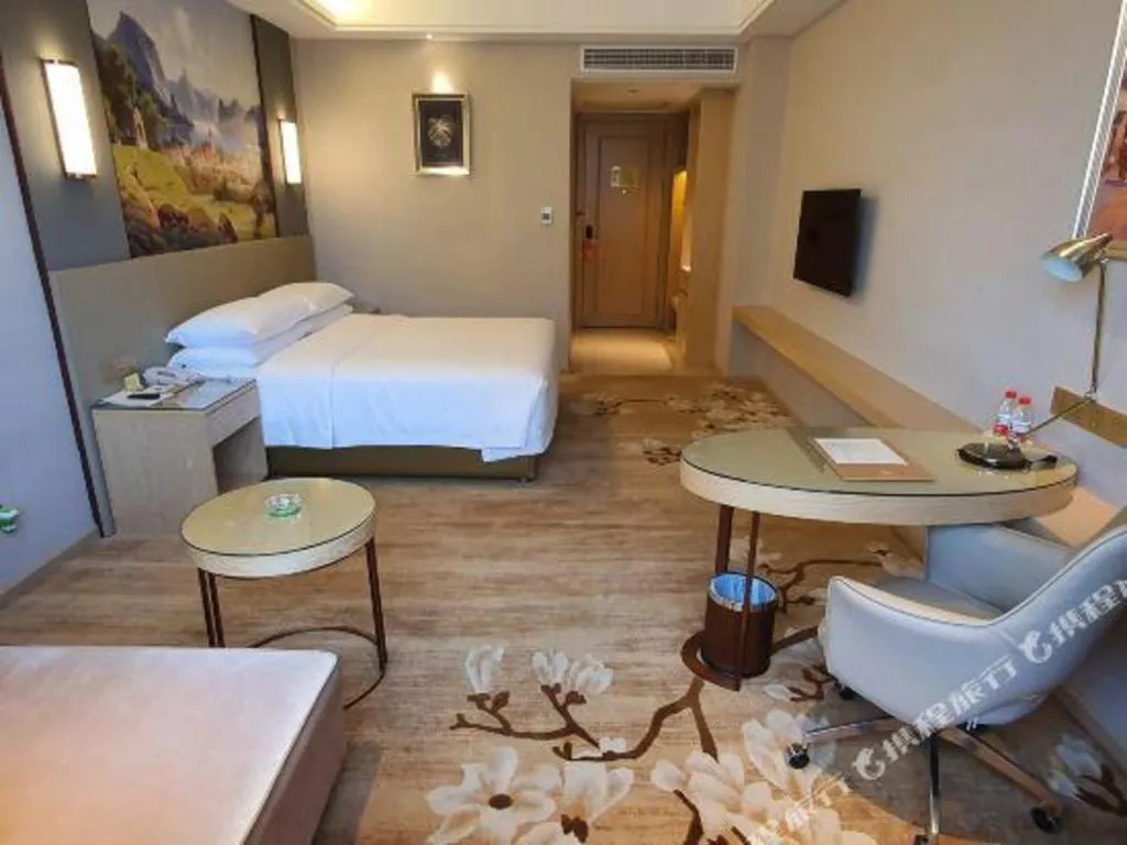 Bed in Vienna Hotel Guangdong Shaoguan Shaonan Avenue