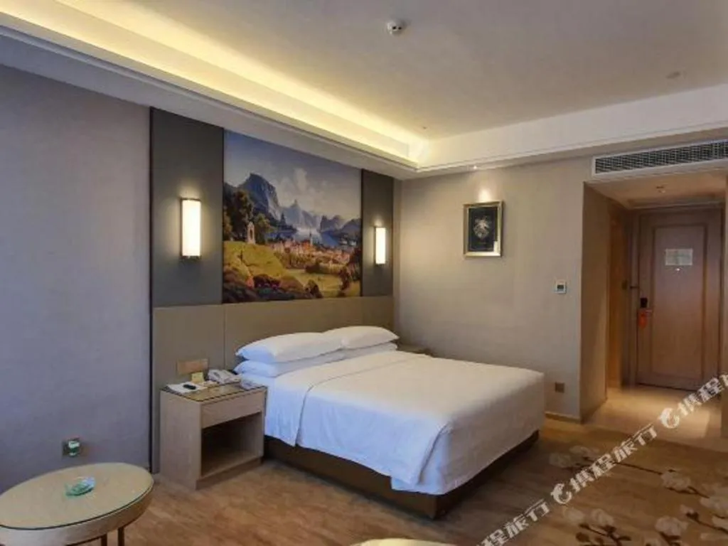 Bed in Vienna Hotel Guangdong Shaoguan Shaonan Avenue