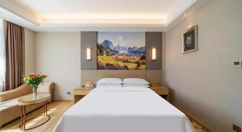 Bed in Vienna Hotel Guangdong Shaoguan Shaonan Avenue