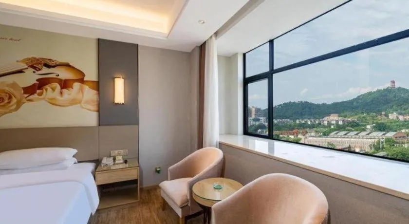 Bed in Vienna Hotel Guangdong Shaoguan Shaonan Avenue