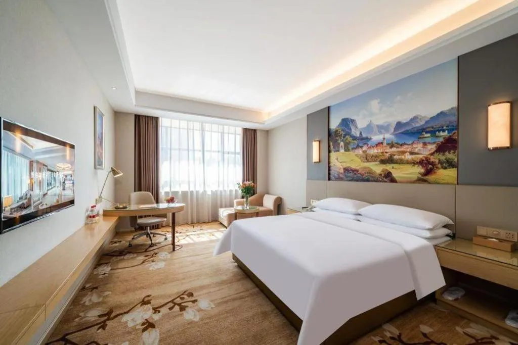 Bed in Vienna Hotel Guangdong Shaoguan Shaonan Avenue