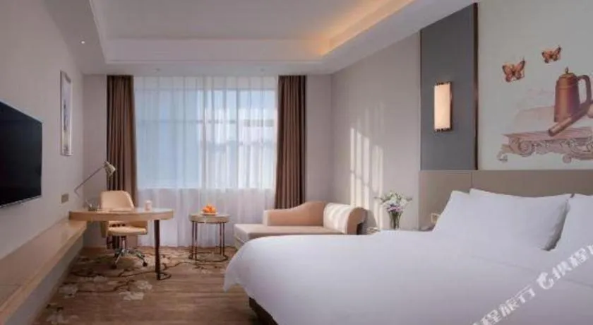 Bed in Vienna Hotel Guangdong Shaoguan Shaonan Avenue