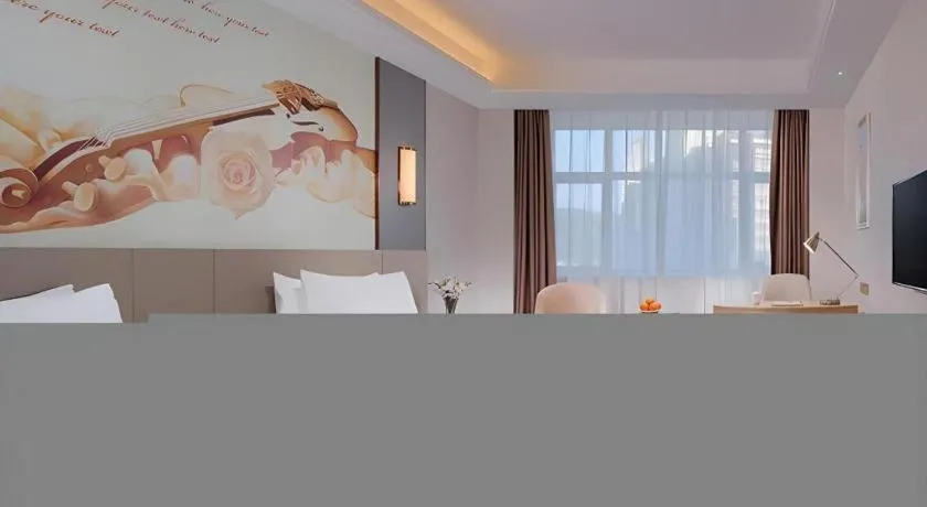 Bed in Vienna Hotel Guangdong Shaoguan Shaonan Avenue