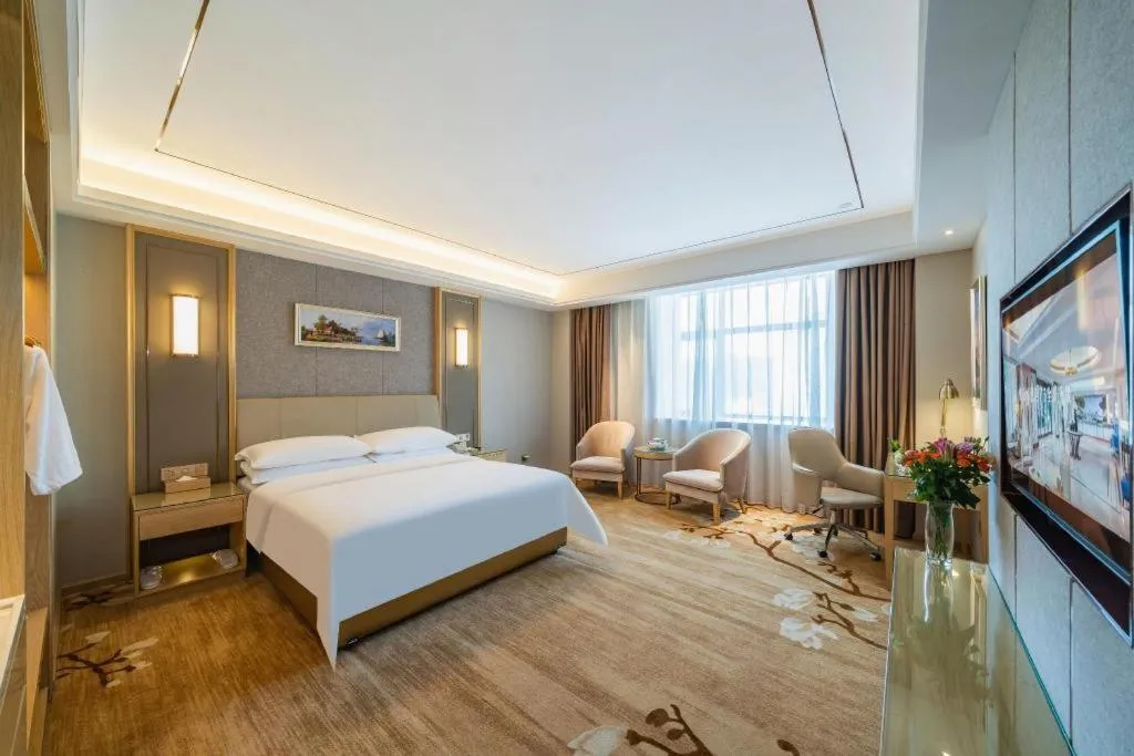 Bed in Vienna Hotel Guangdong Shaoguan Shaonan Avenue