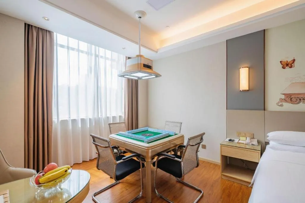 Bed in Vienna Hotel Guangdong Shaoguan Shaonan Avenue