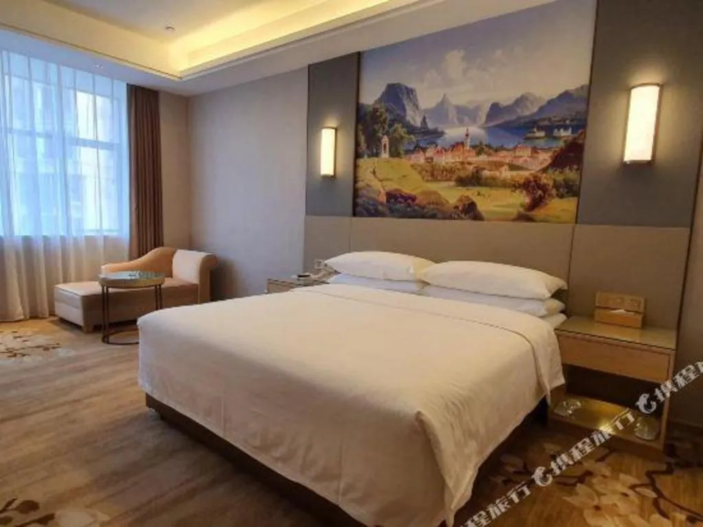 Bed in Vienna Hotel Guangdong Shaoguan Shaonan Avenue