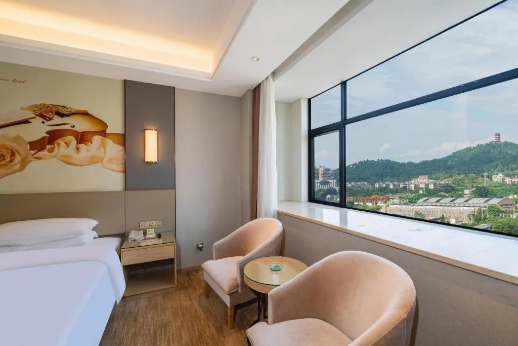 Bed in Vienna Hotel Guangdong Shaoguan Shaonan Avenue