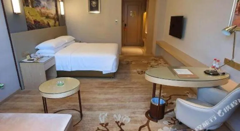 Bed in Vienna Hotel Guangdong Shaoguan Shaonan Avenue