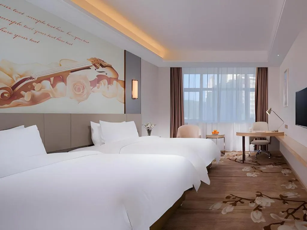 Bed in Vienna Hotel Guangdong Shaoguan Shaonan Avenue