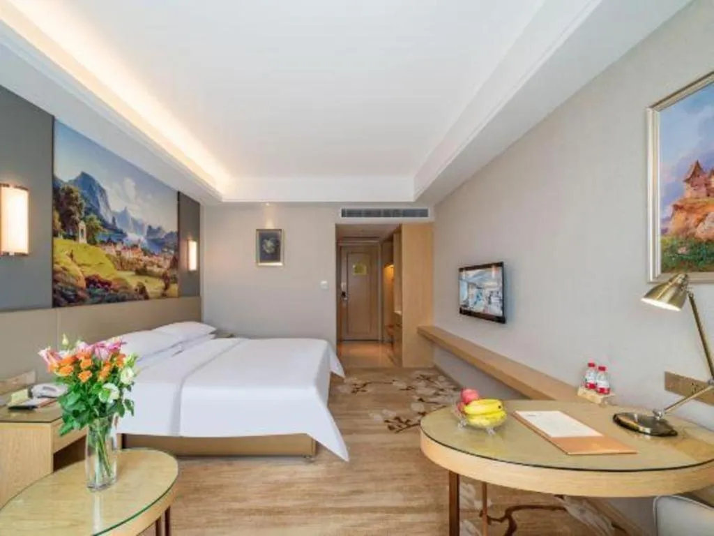 Bed in Vienna Hotel Guangdong Shaoguan Shaonan Avenue