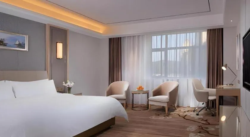 Bed in Vienna Hotel Guangdong Shaoguan Shaonan Avenue