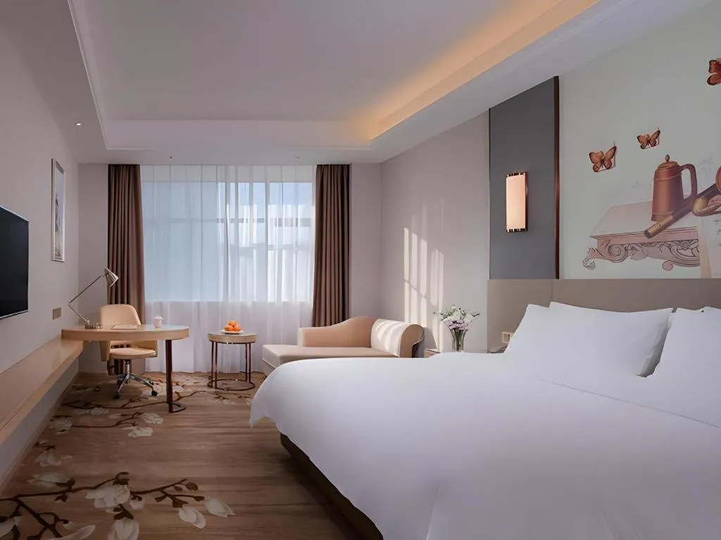 Bed in Vienna Hotel Guangdong Shaoguan Shaonan Avenue