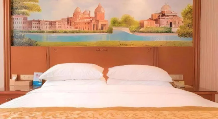 Bed in Vienna Hotel Shandong Qingdao Taidong Pijiu Street Liaoning Road