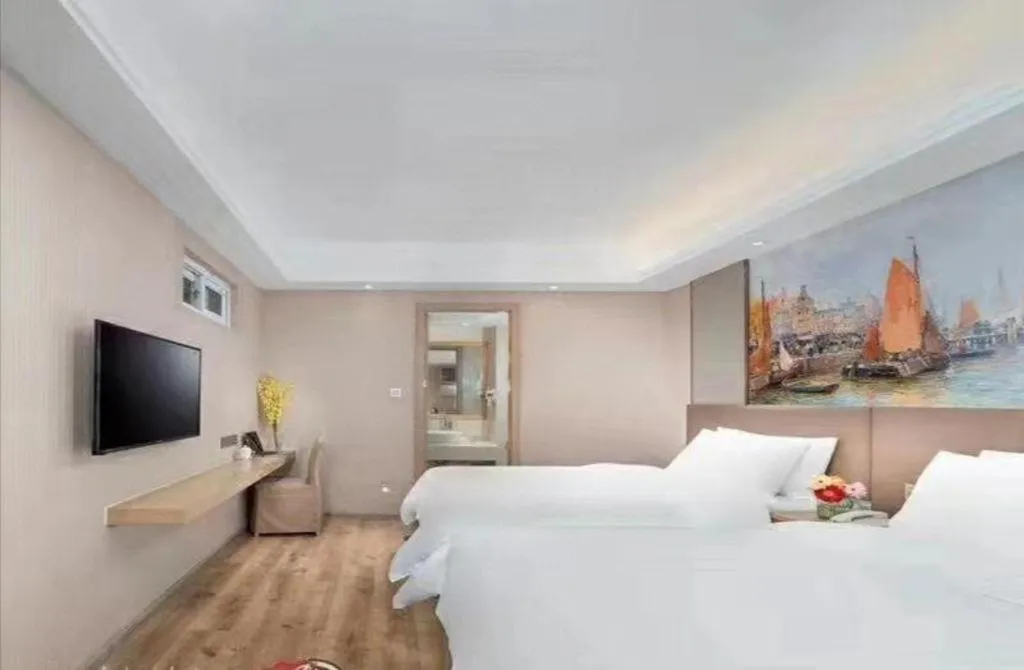 Bed in Vienna Hotel Shandong Qingdao Taidong Pijiu Street Liaoning Road