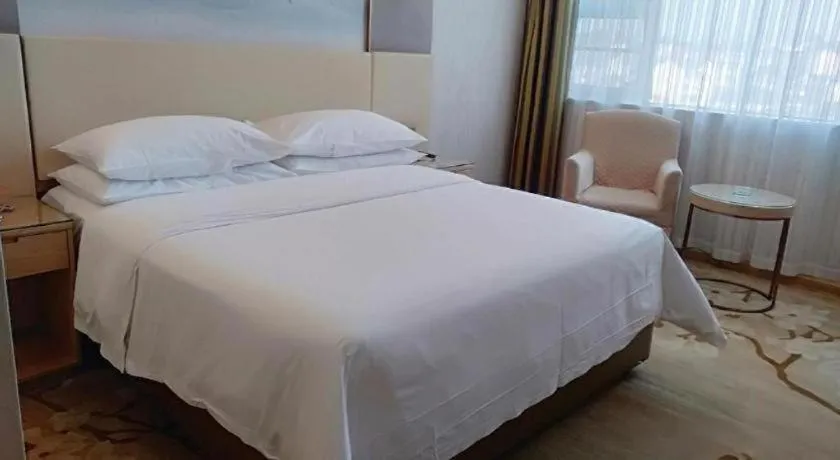 Bed in Vienna Hotel Hunan Huaihua Xupu Wanda Plaza