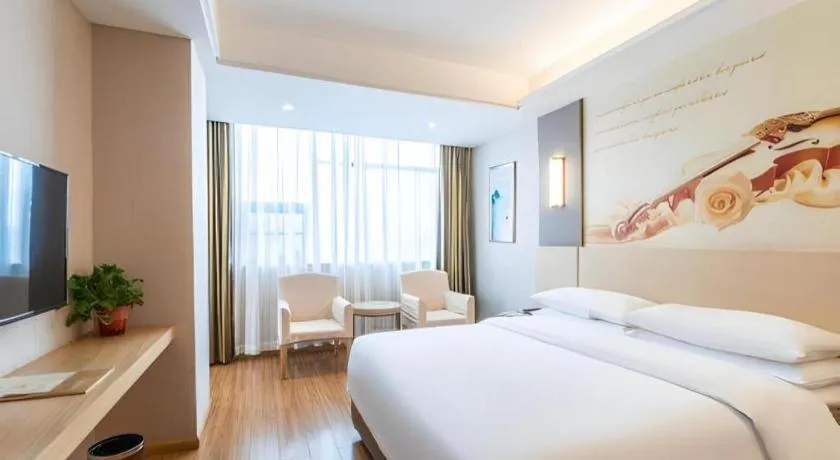 Bed in Vienna Hotel Hunan Huaihua Xupu Wanda Plaza