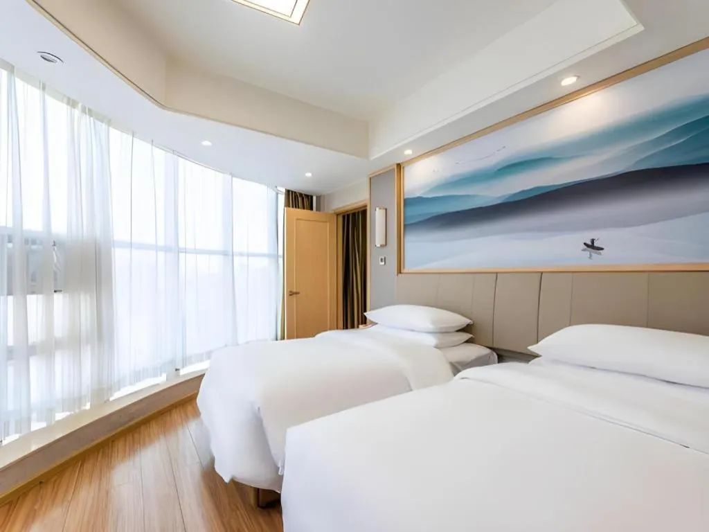 Bed in Vienna Hotel Hunan Huaihua Xupu Wanda Plaza