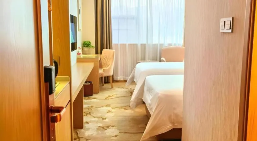 Bed in Vienna Hotel Hunan Huaihua Xupu Wanda Plaza