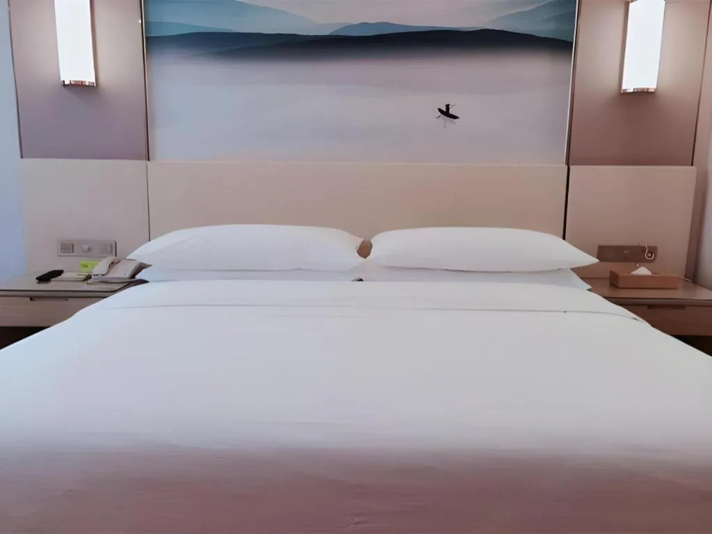 Bed in Vienna Hotel Hunan Huaihua Xupu Wanda Plaza