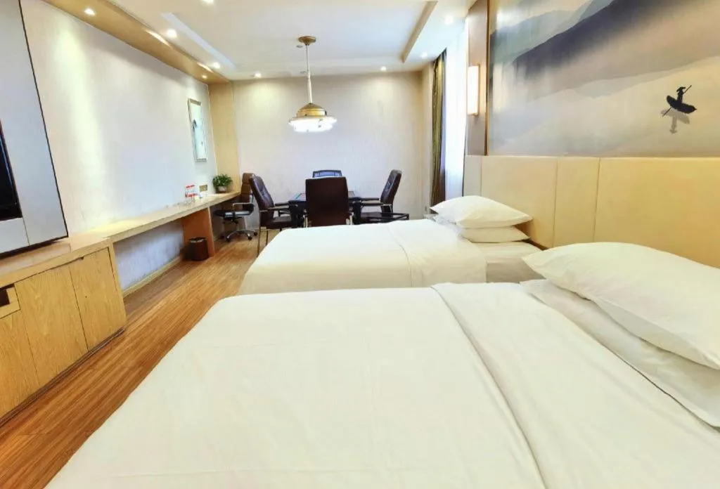 Bed in Vienna Hotel Hunan Huaihua Xupu Wanda Plaza
