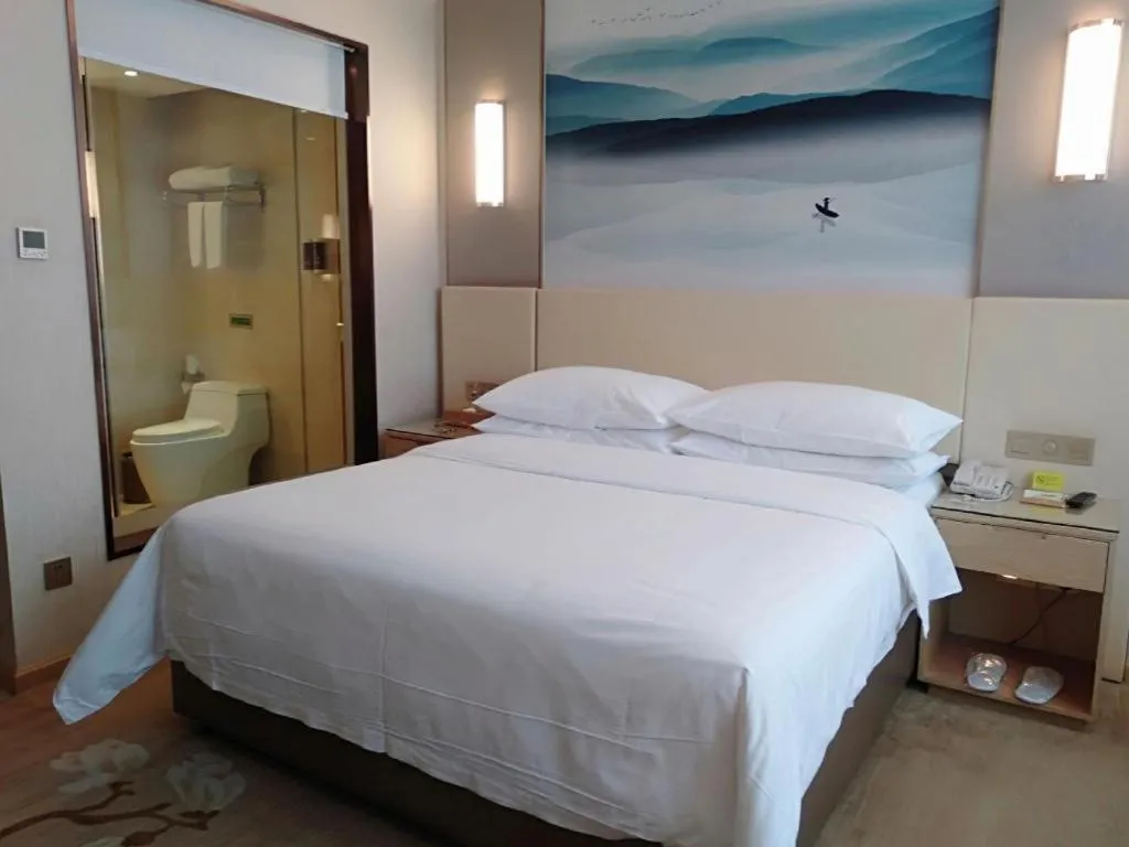 Bed in Vienna Hotel Hunan Huaihua Xupu Wanda Plaza