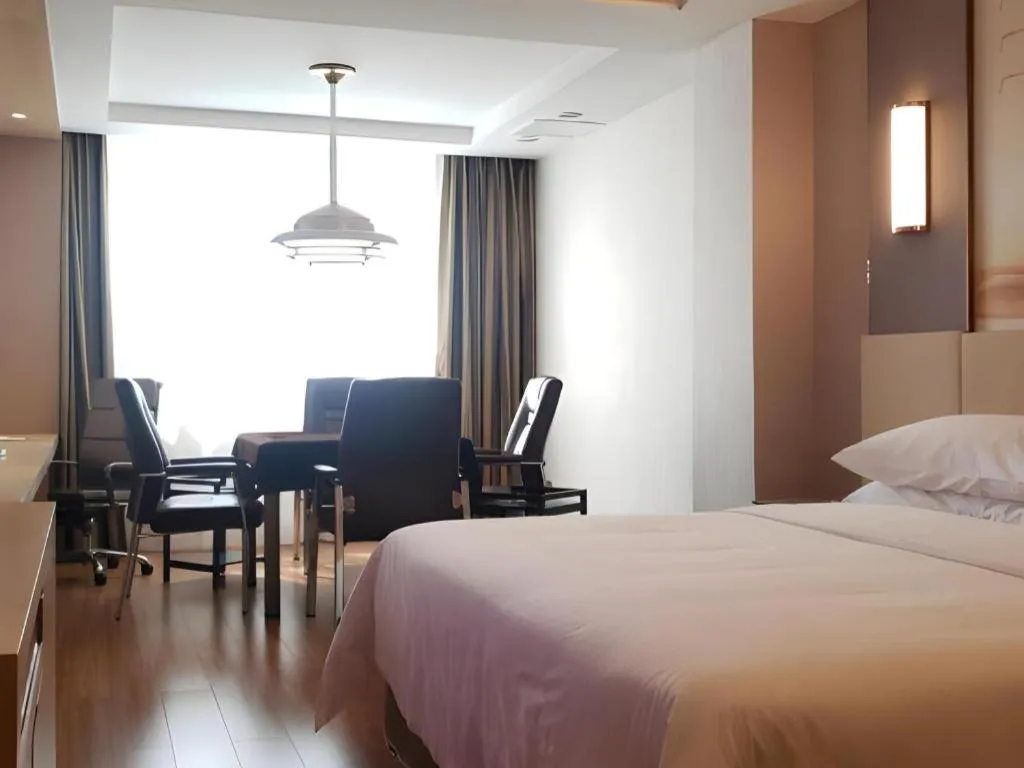 Bed in Vienna Hotel Hunan Huaihua Xupu Wanda Plaza