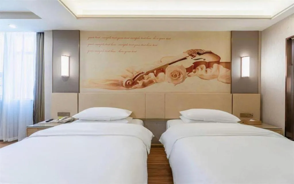 Bed in Vienna Hotel Hunan Huaihua Xupu Wanda Plaza