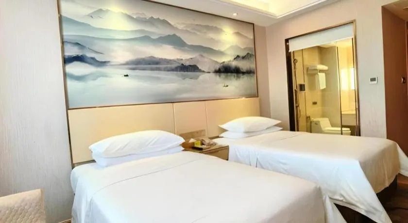 Bed in Vienna Hotel Hunan Huaihua Xupu Wanda Plaza