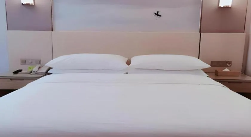 Bed in Vienna Hotel Hunan Huaihua Xupu Wanda Plaza