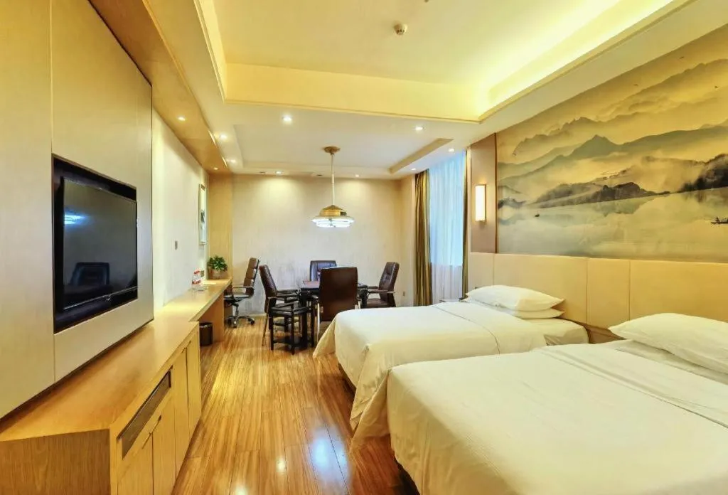 Bed in Vienna Hotel Hunan Huaihua Xupu Wanda Plaza