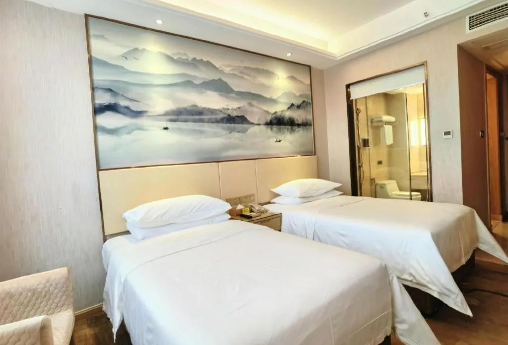 Bed in Vienna Hotel Hunan Huaihua Xupu Wanda Plaza