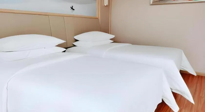 Bed in Vienna Hotel Hunan Huaihua Xupu Wanda Plaza
