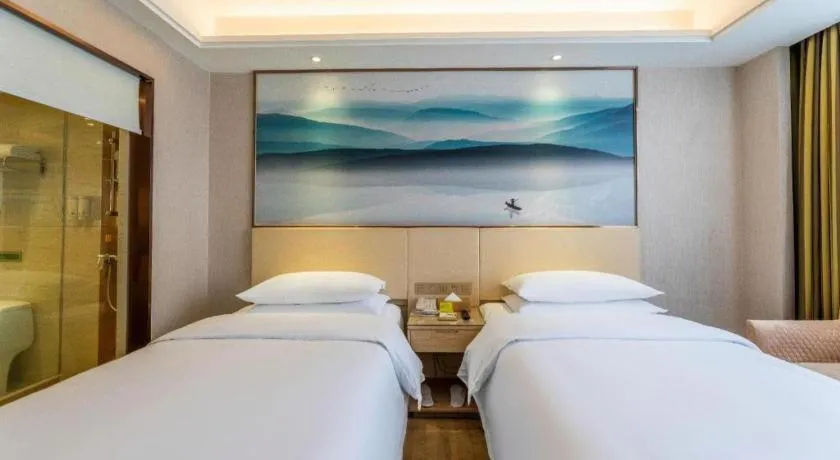 Bed in Vienna Hotel Hunan Huaihua Xupu Wanda Plaza