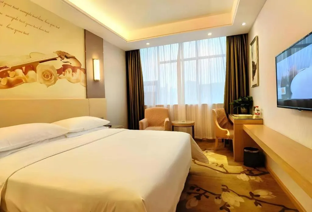 Bed in Vienna Hotel Hunan Huaihua Xupu Wanda Plaza