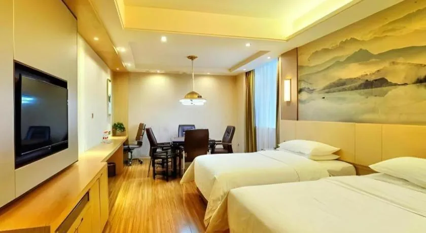 Bed in Vienna Hotel Hunan Huaihua Xupu Wanda Plaza