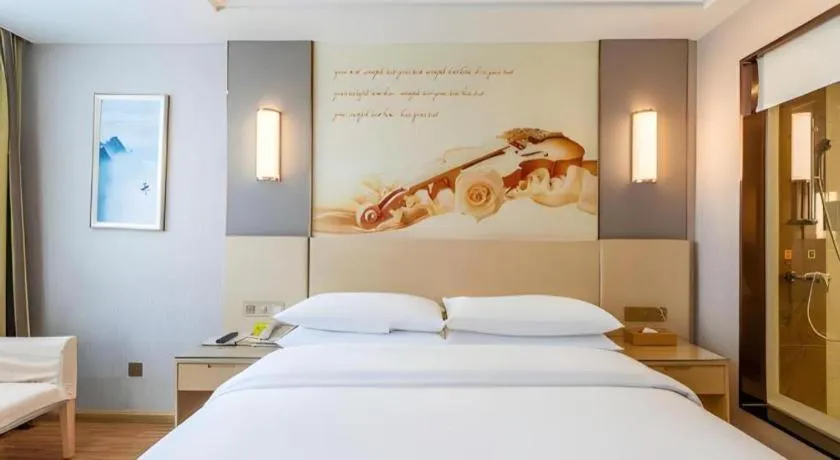 Bed in Vienna Hotel Hunan Huaihua Xupu Wanda Plaza