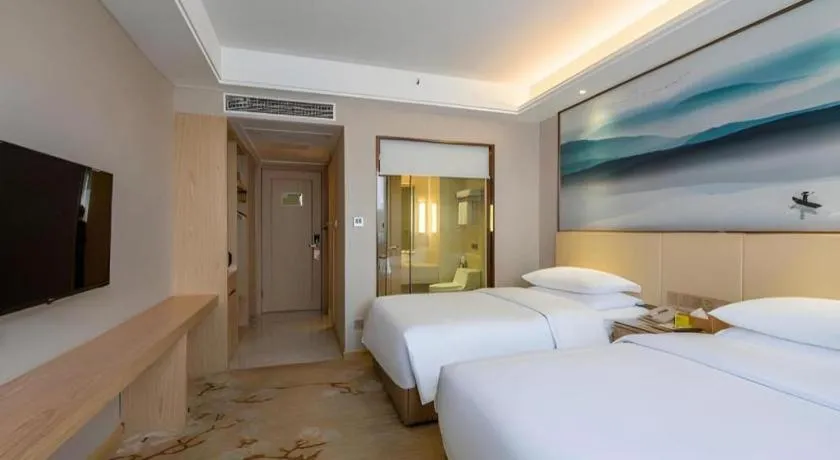 Bed in Vienna Hotel Hunan Huaihua Xupu Wanda Plaza