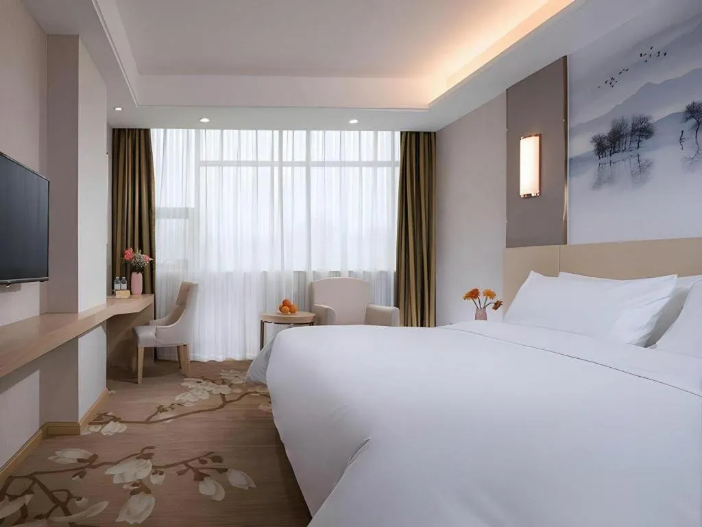 Bed in Vienna Hotel Hunan Huaihua Xupu Wanda Plaza