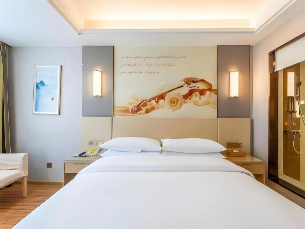 Bed in Vienna Hotel Hunan Huaihua Xupu Wanda Plaza